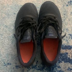 All black Nike metcons